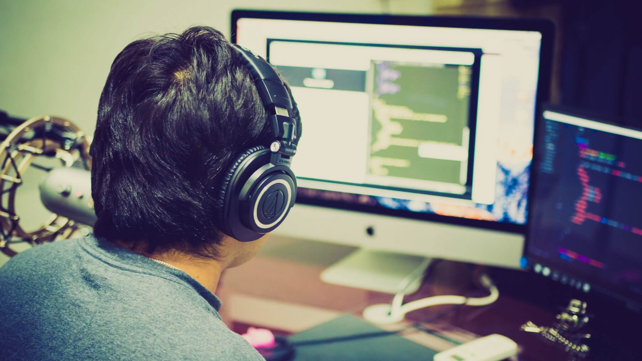 Man wearing headphone and working